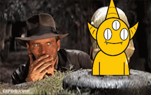 Man In Hat Covering Mouth Next To Yellow Three-Eyed Monster GIF
