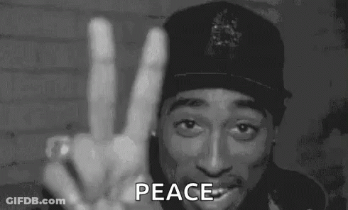 Man In Hat Giving Peace Sign GIF
