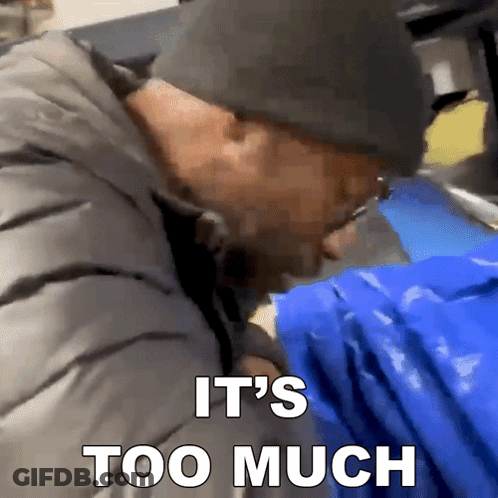 Man In Hat Holding Blue Bag Saying It's Too Much On The Bottom GIF