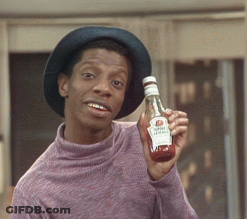 Man In Hat Holding Bottle Of Ketchup GIF