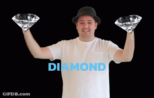 Man In Hat Holding Two Diamonds Diamond Hands GIF
