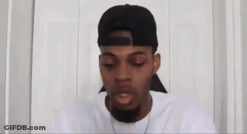 Man In Hat Looking At Cell Phone GIF
