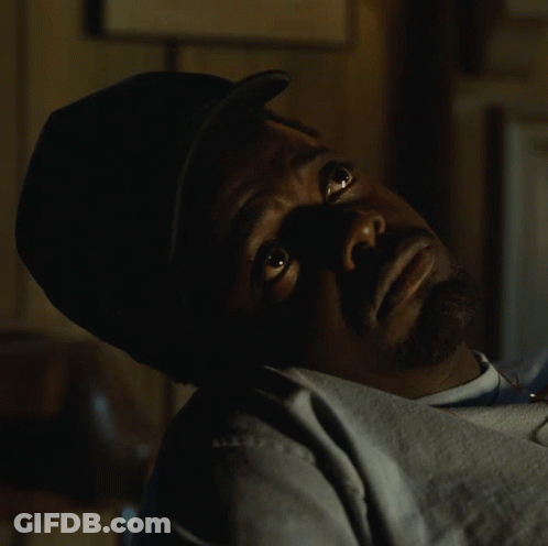 Man In Hat Lying Down Looking Up GIF