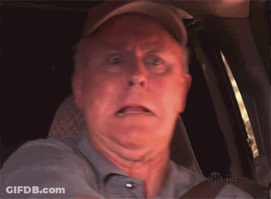Man In Hat Making Funny Face In Car GIF