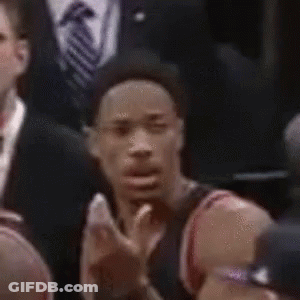 Man In Hat Making Funny Face In Crowd GIF