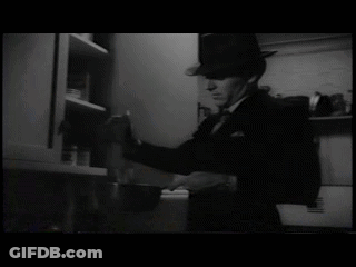 Man In Hat Opening Kitchen Cabinet GIF