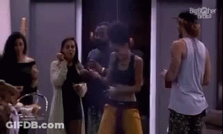 Man In Hat Opening Wine In Front Of Tomorrow Sign GIF
