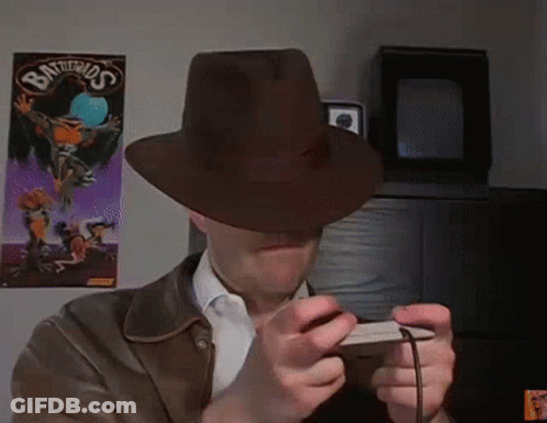 Man In Hat Playing Video Game Battlerios GIF