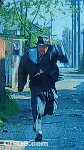 Man In Hat Running With Bag GIF