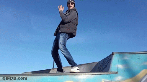 Man In Hat Saying Aaron Standing On Ramp GIF