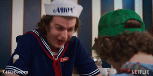 Man In Hat Saying Ahoy Talking To Another Man GIF