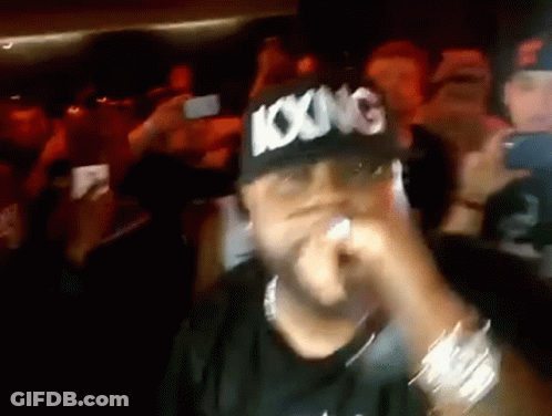 Man In Hat Saying Boxing In Front Of Crowd GIF