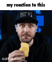 Man In Hat Saying Delete Files Holding Bread GIF