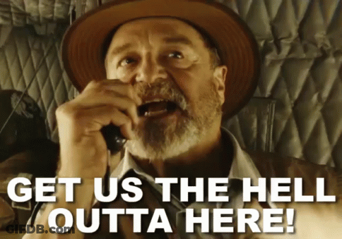 Man In Hat Saying Get Us The Hell Outta Here On Phone GIF