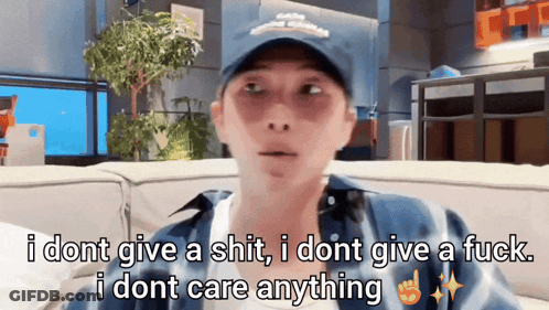 Man In Hat Saying I Don't Care GIF