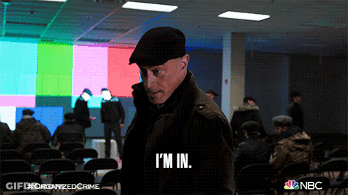 Man In Hat Saying I'm In On Cell Phone GIF