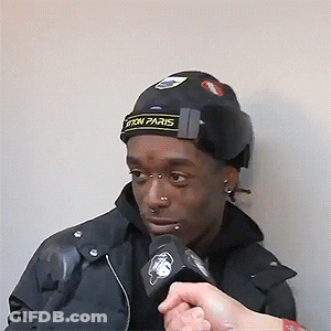 Man In Hat Saying Paris Interviewed GIF