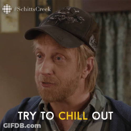 Man In Hat Saying Try To Chill Out GIF