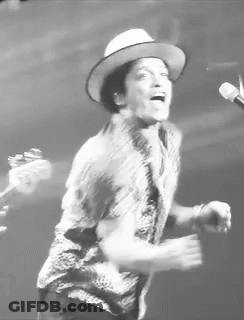 Man In Hat Singing Into Mic GIF