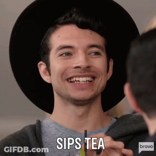 Man In Hat Sipping Tea GIF