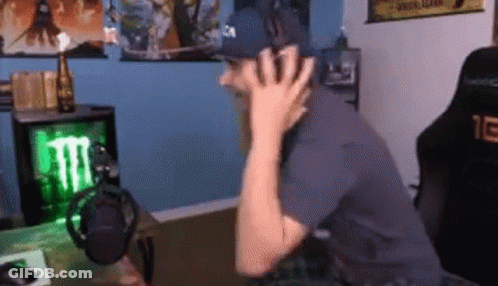 Man In Hat Sitting At Microphone GIF