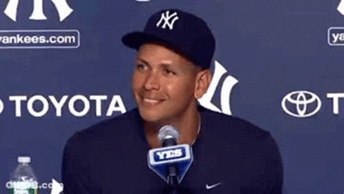 Man In Hat Sitting At Microphone GIF