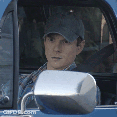 Man In Hat Sitting In Blue Car GIF