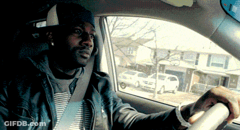 Man In Hat Sitting In Car Looking Out Window GIF