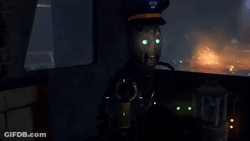 Man In Hat Sitting In Dark Room GIF