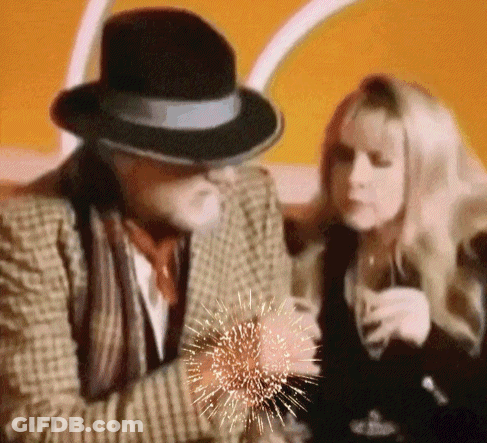 Man In Hat Sitting Next To Woman GIF