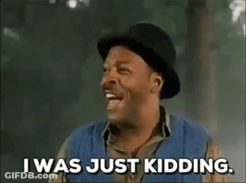 Man In Hat Smiling Saying I Was Just Kidding GIF
