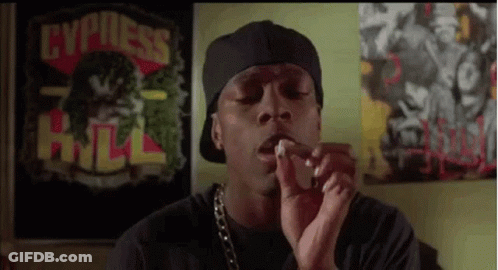 Man In Hat Smoking Cigarette GIF