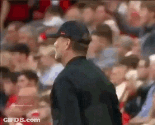 Man In Hat Standing Before Crowd GIF