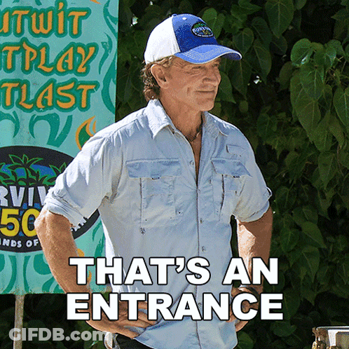 Man In Hat Standing In Front Of Sign Saying That's An Entrance GIF