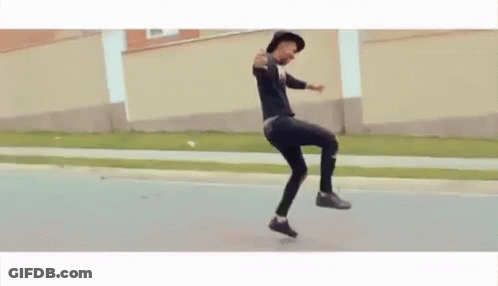 Man In Hat Standing On One Leg GIF