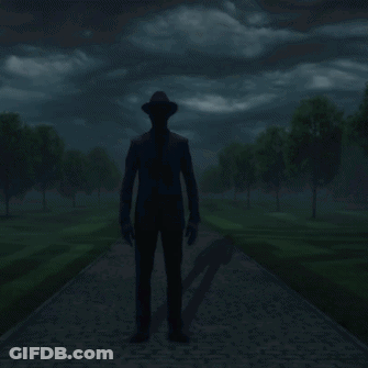 Man In Hat Standing On Path GIF