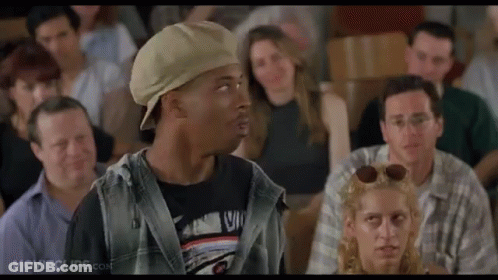 Man In Hat Talking To Group In Classroom GIF