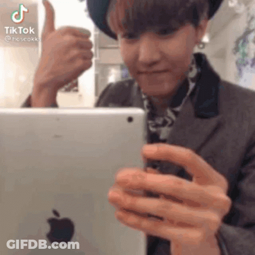 Man In Hat Thumbs Up Holding Tablet GIF