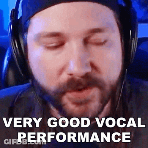 Man In Hat Turtleneck Asks What To Say GIF