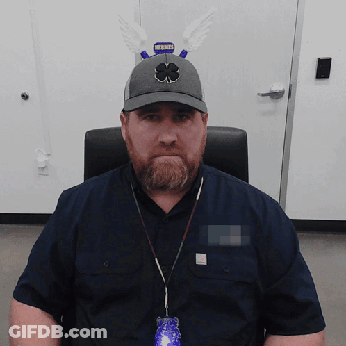 Man In Hat With Clover Saying Hermes GIF