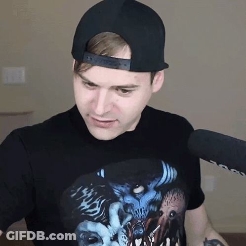 Man In Hat With Demon T-Shirt GIF