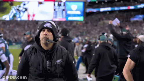 Man In Hat With Eagles On Football Field GIF