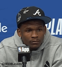 Man In Hat With Letter A At Microphone GIF