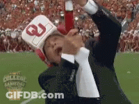 Man In Hat With Letter G Holding Bottle GIF