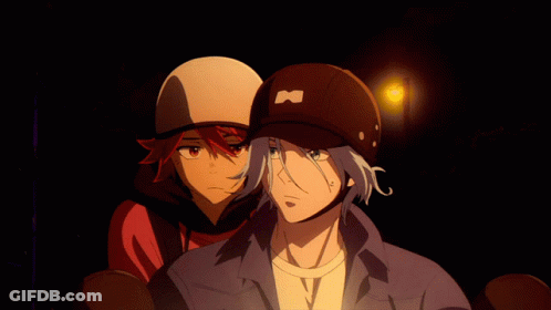 Man In Hat With Letter M Next To Another Man GIF