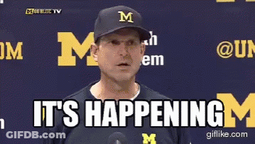 Man In Hat With Letter M Saying It's Happening GIF