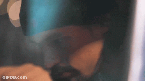Man In Hat With Letter P Covering Mouth GIF