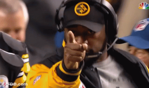 Man In Hat With Letter S Pointing GIF