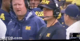 Man In Hat With M Watching Football GIF