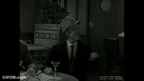 Man In Hat With Martini Glass Saying For A Big One GIF